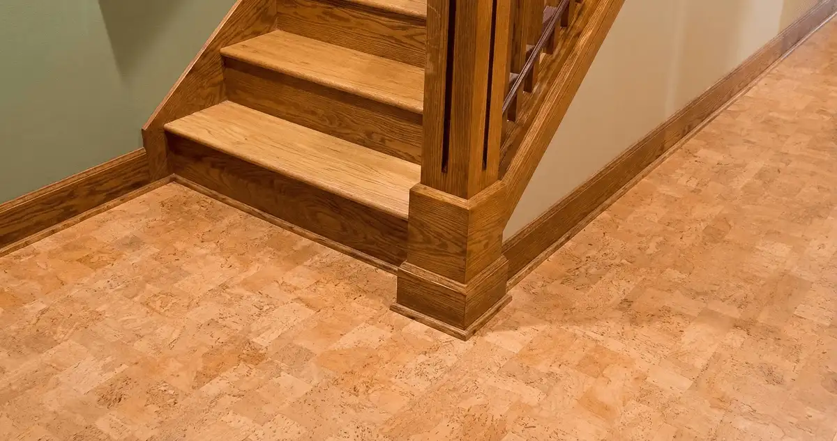 End of a staircase with cork flooring in Boston, MA