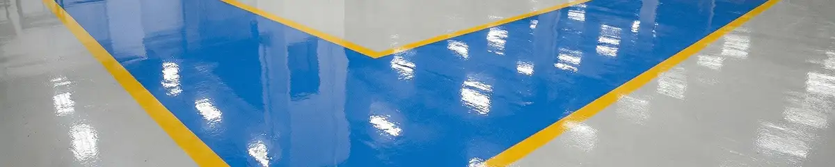 A factory floor professionally covered and marked with epoxy flooring in Boston, MA