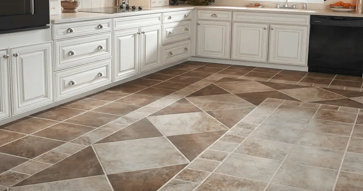 Kitchen with white cabinets and a professionally installed tile floor in Boston, MA